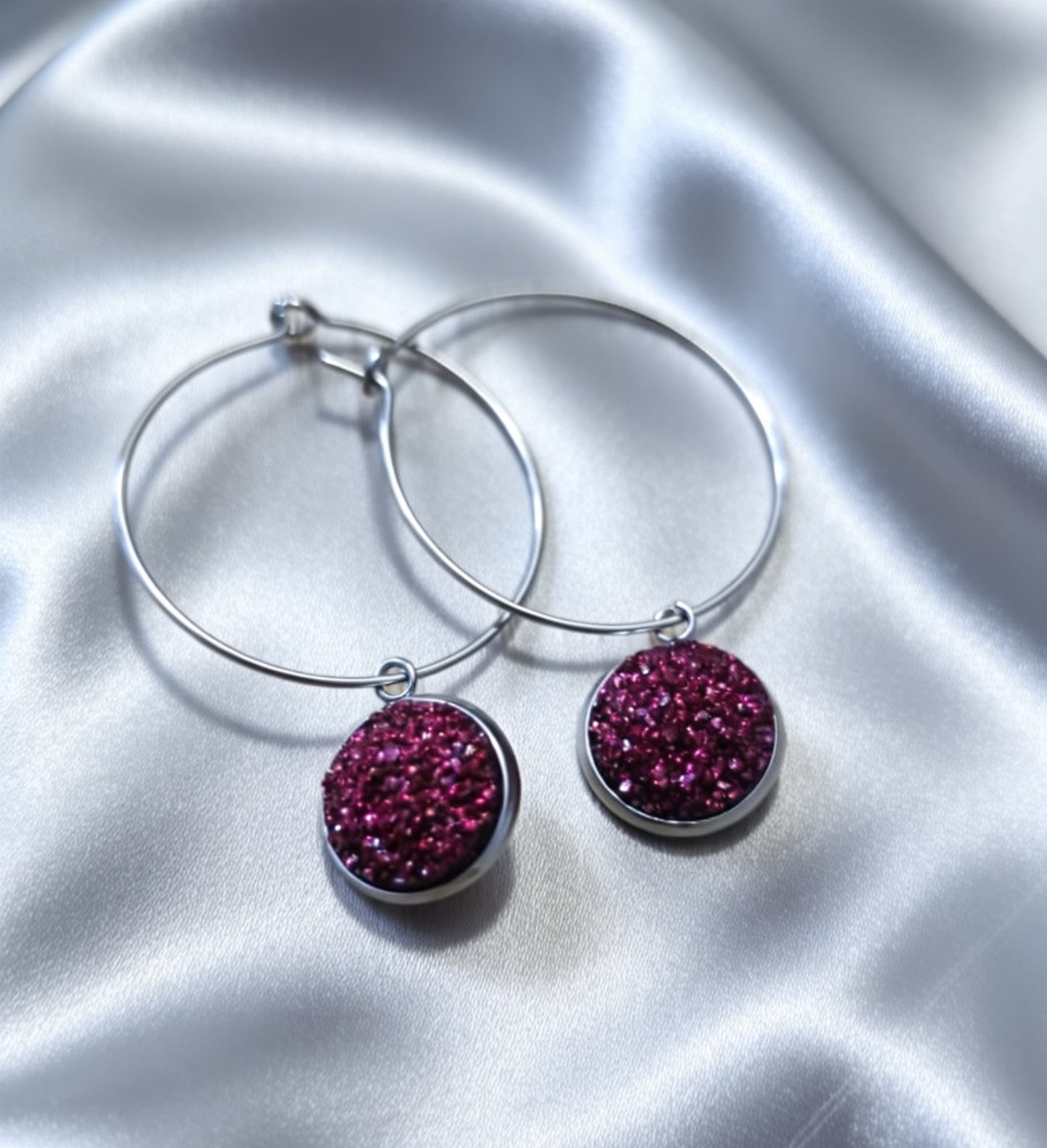 Hoop Earrings with round charm in silver tone