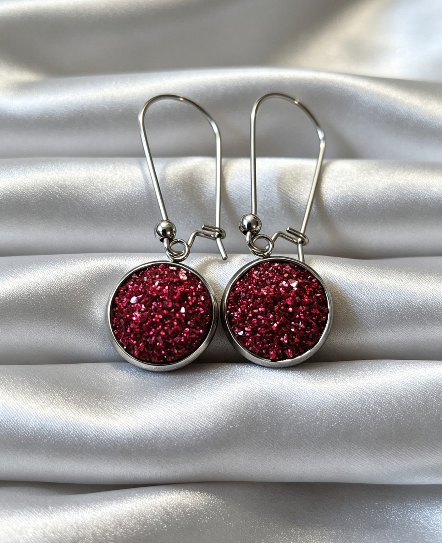Drop Earrings with round charm in silver tone