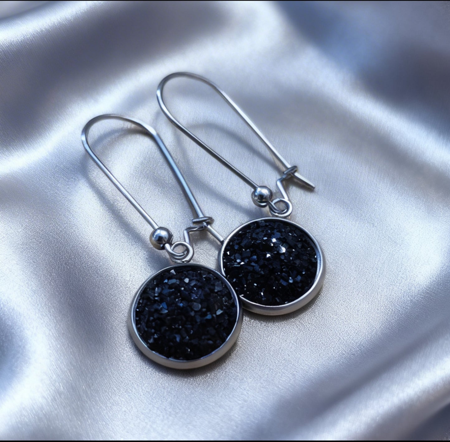 Drop Earrings with round charm in silver tone
