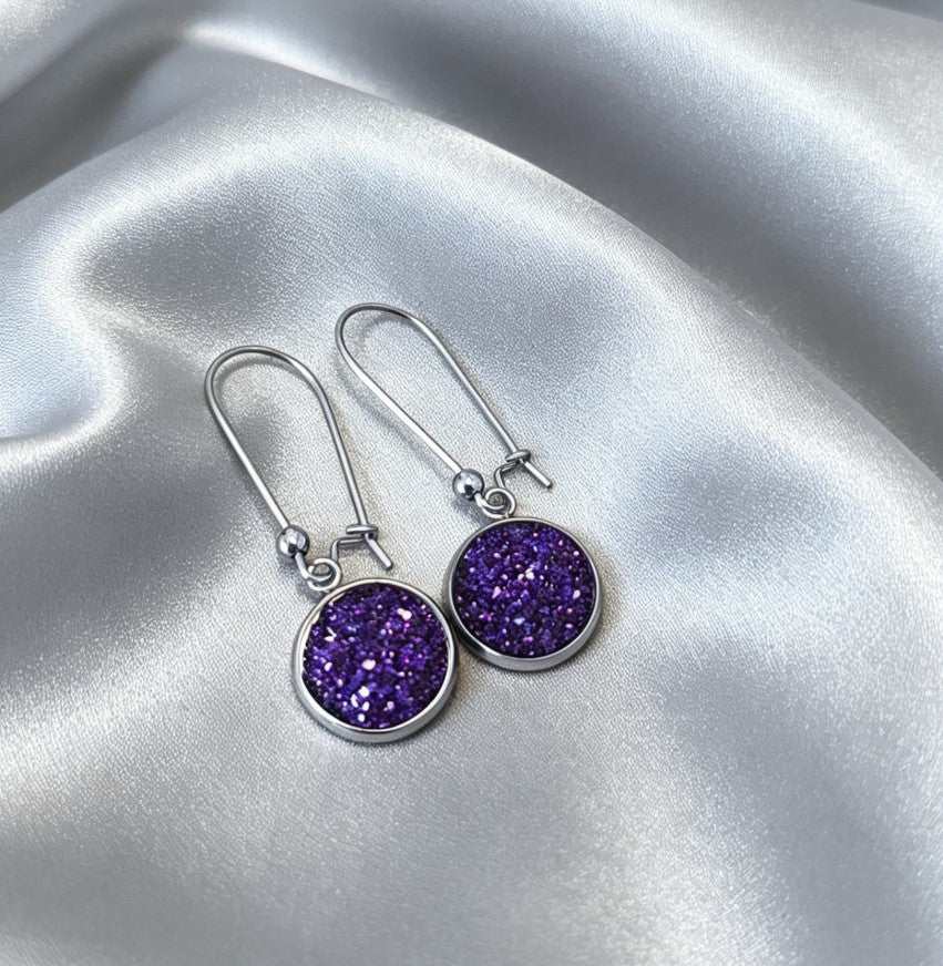 Drop Earrings with round charm in silver tone
