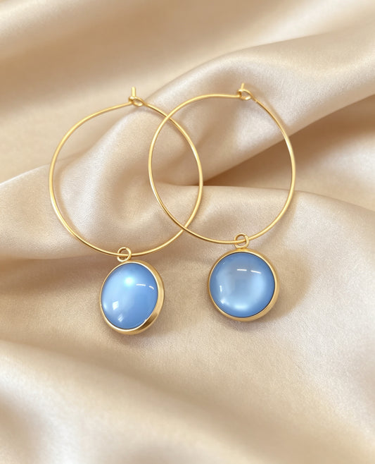 Hoop Earrings with round charm in gold tone