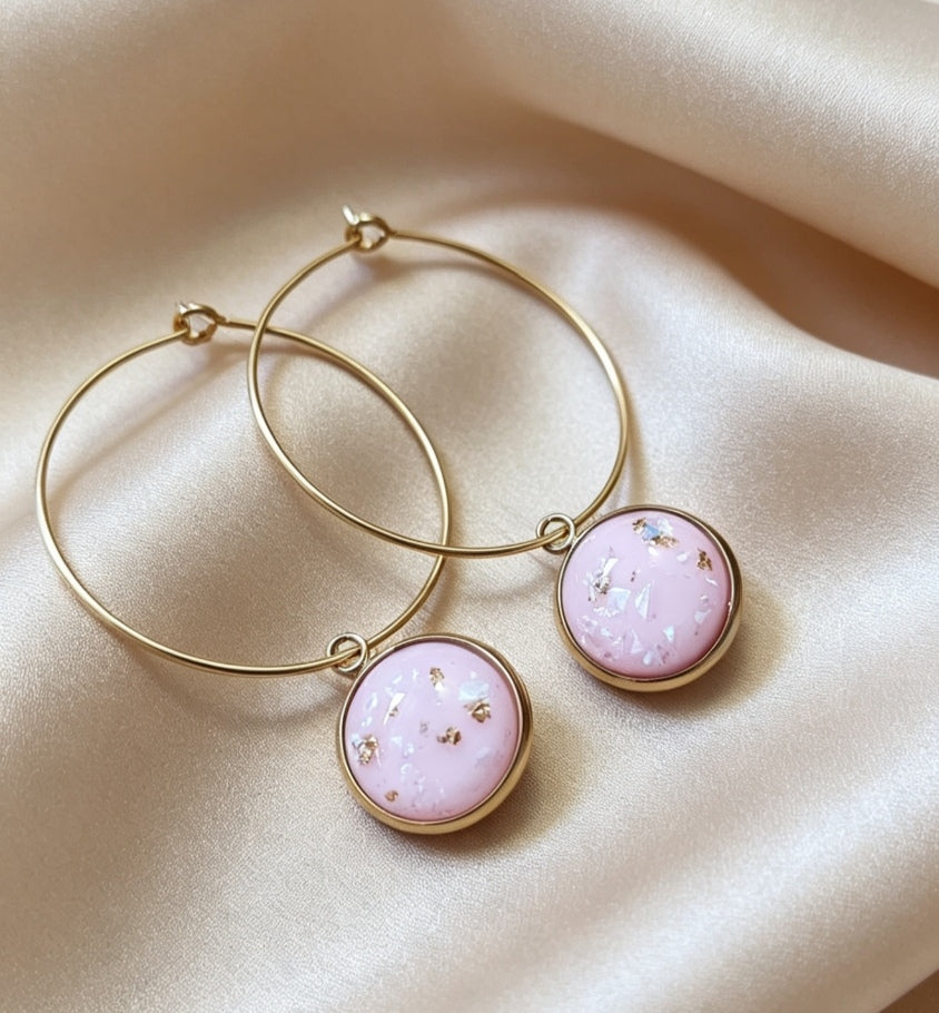 Hoop Earrings with round charm in gold tone