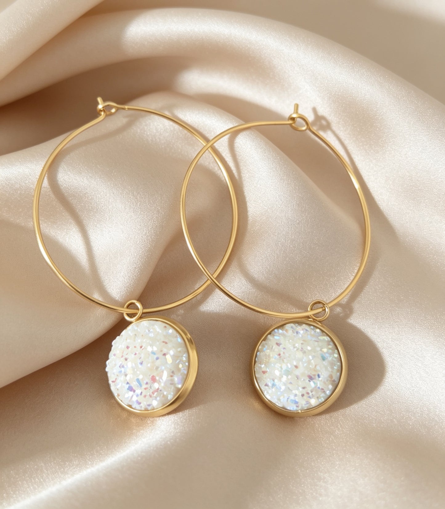 Hoop Earrings with round charm in gold tone