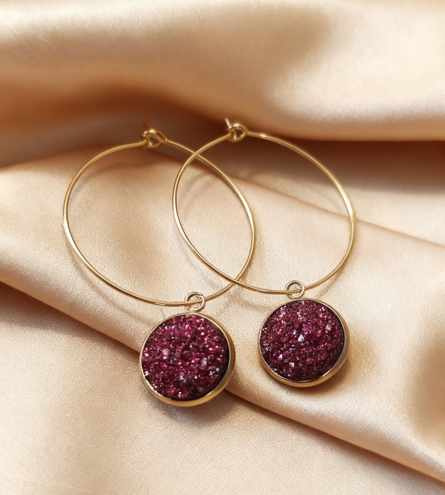 Hoop Earrings with round charm in gold tone