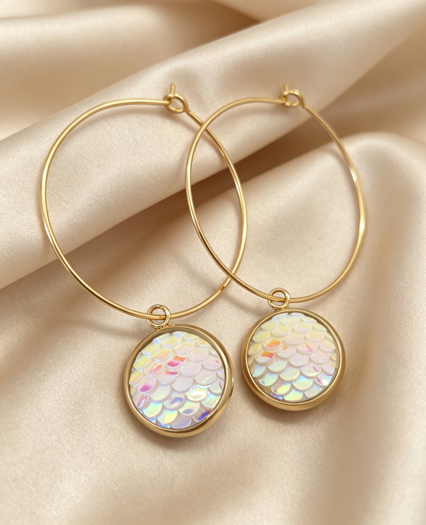 Hoop Earrings with round charm in gold tone