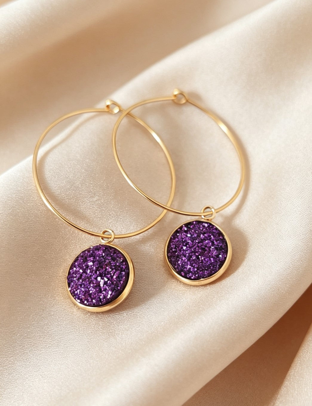 Hoop Earrings with round charm in gold tone