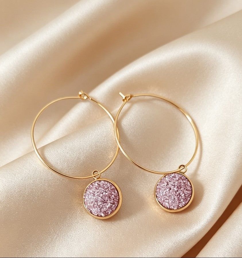 Hoop Earrings with round charm in gold tone