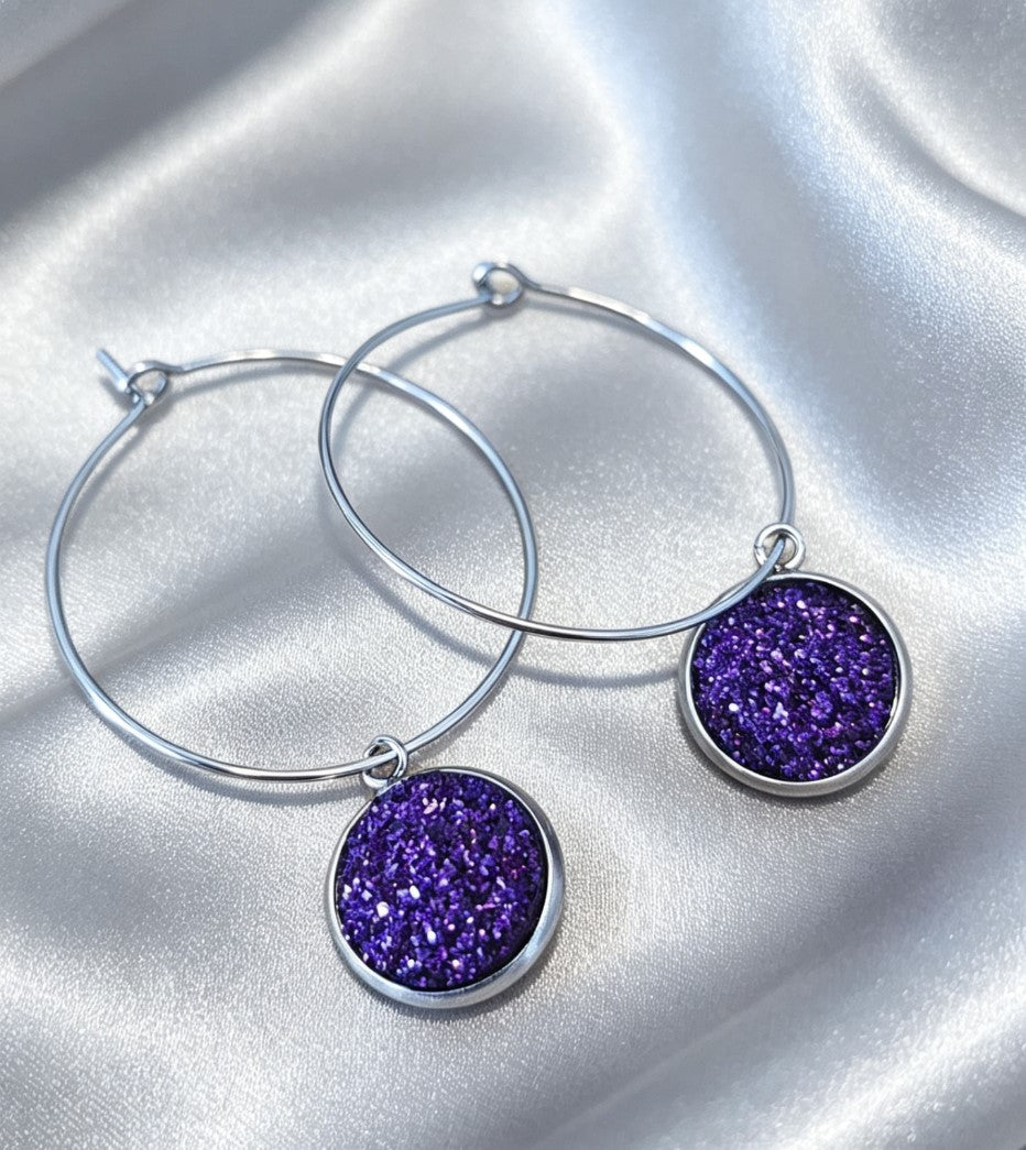 Hoop Earrings with round charm in silver tone