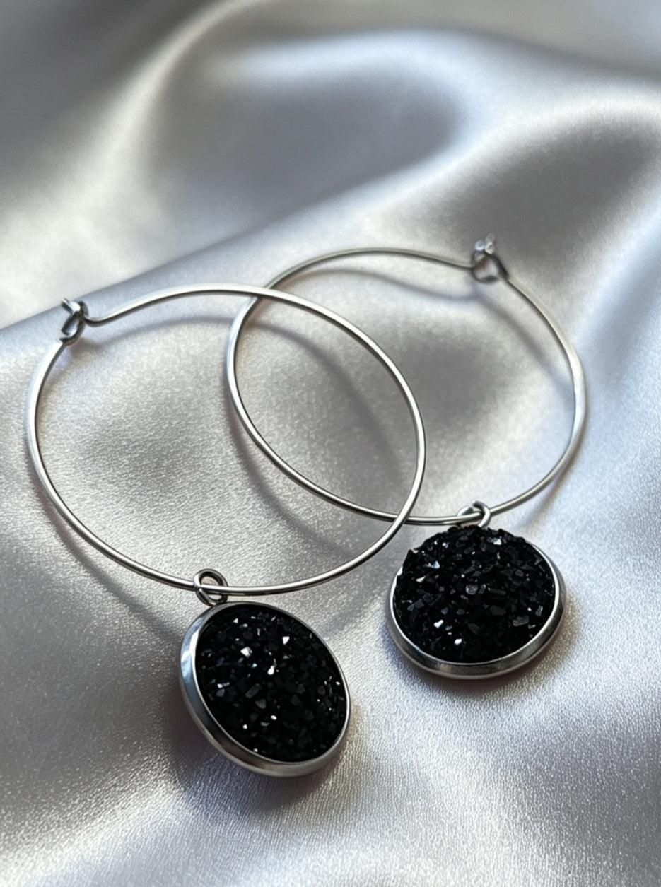Hoop Earrings with round charm in silver tone
